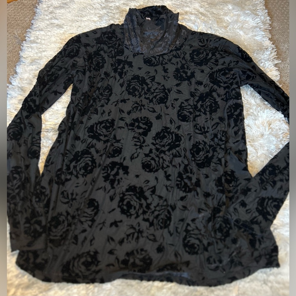 Beautiful black mesh top with velour floral design. Worn twice. Size XL.